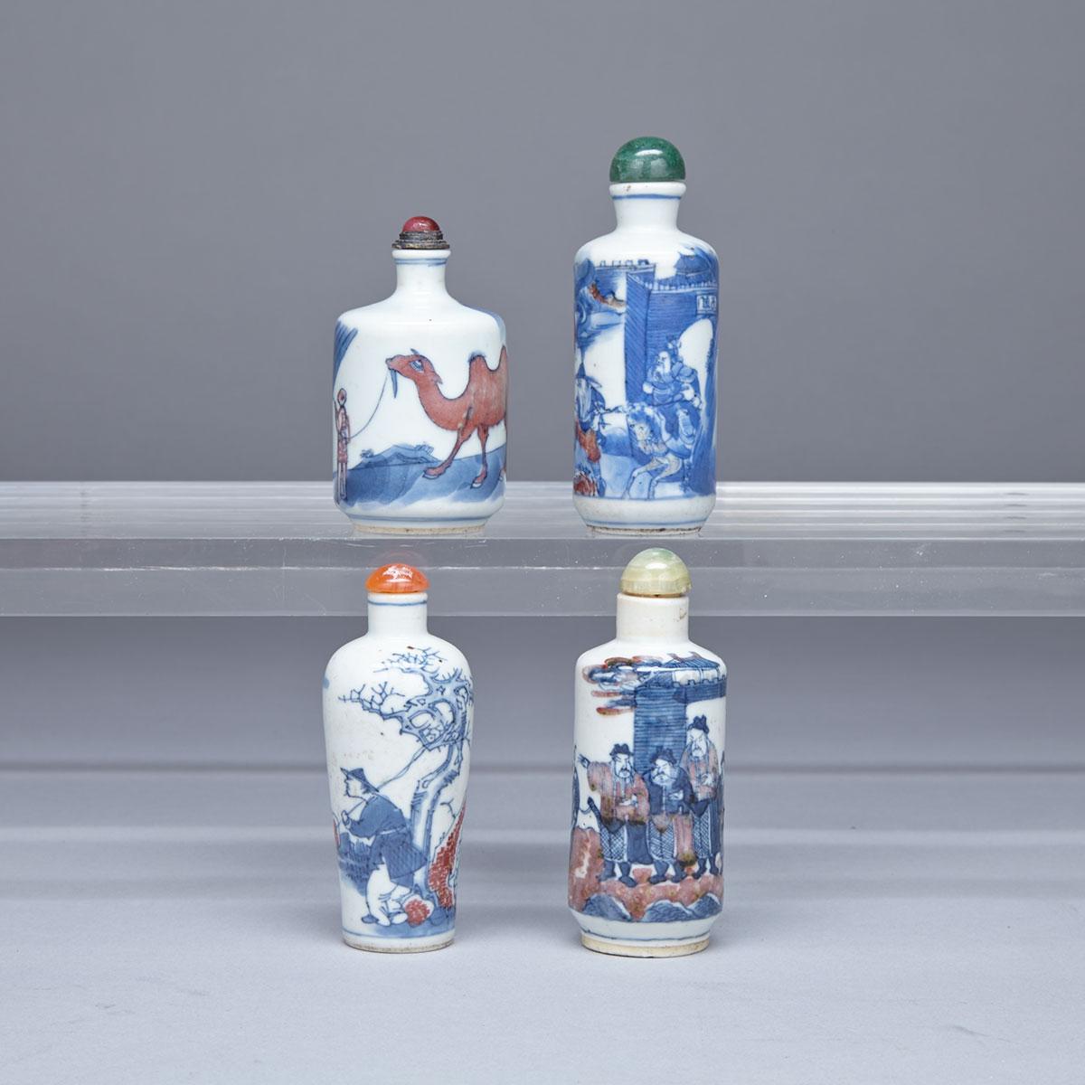 Four Blue, White and Copper Red Snuff Bottles, 19th Century