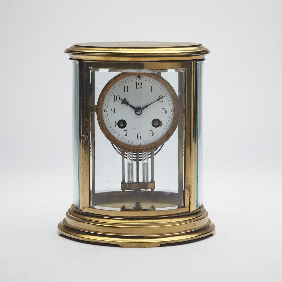 French Oval Glass Panelled Brass Regulator, early 20th century