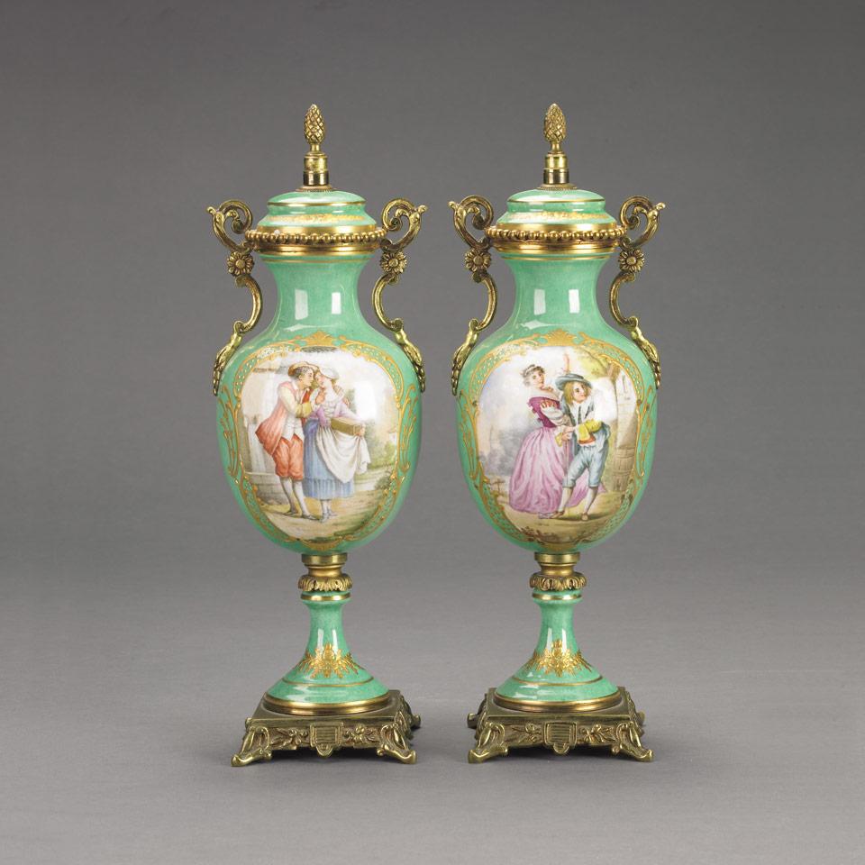 Pair of Gilt Metal Mounted French Porcelain Covered Vases, 20th century