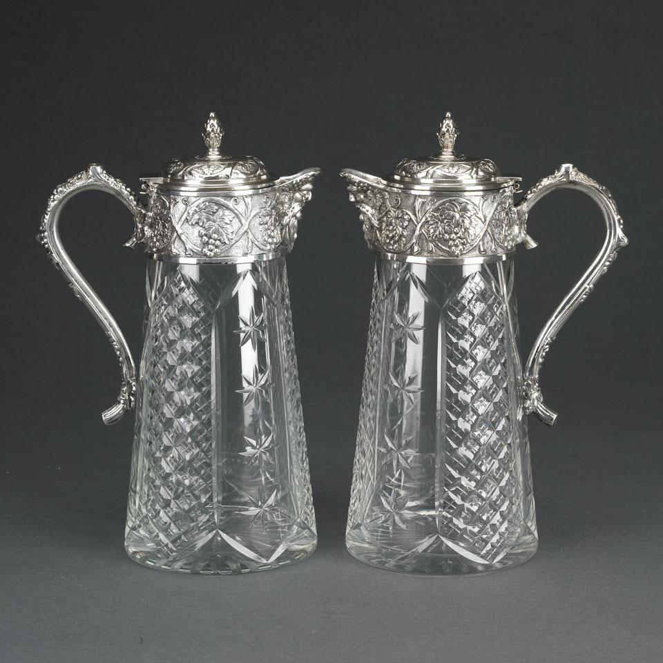 Pair of Continental Electroplate Mounted Cut Glass Claret Jugs, early 20th century