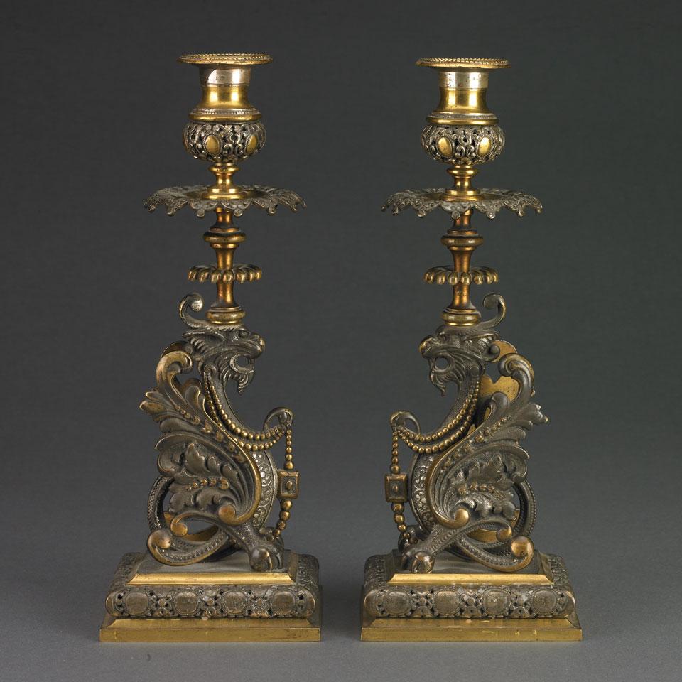 Pair of Continental Silvered and Gilt  Bronze Griffin Form Candlesticks, late 19th century