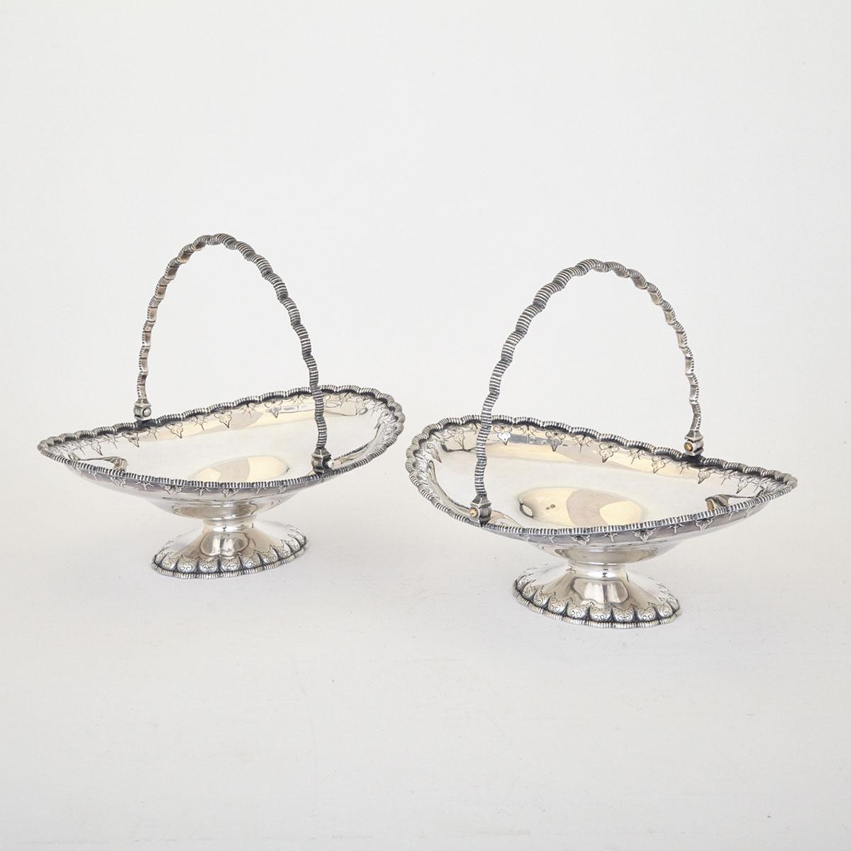 Pair of American Silver Cake Baskets, Grosjean & Woodward for Tiffany & Co., New York, N.Y., c.1854