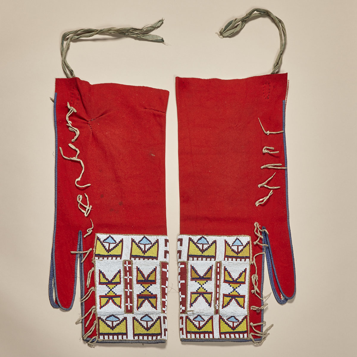 ATHABASKAN LEGGINGS WITH SPOT STITCHED BEADED PANELS ON FABRIC