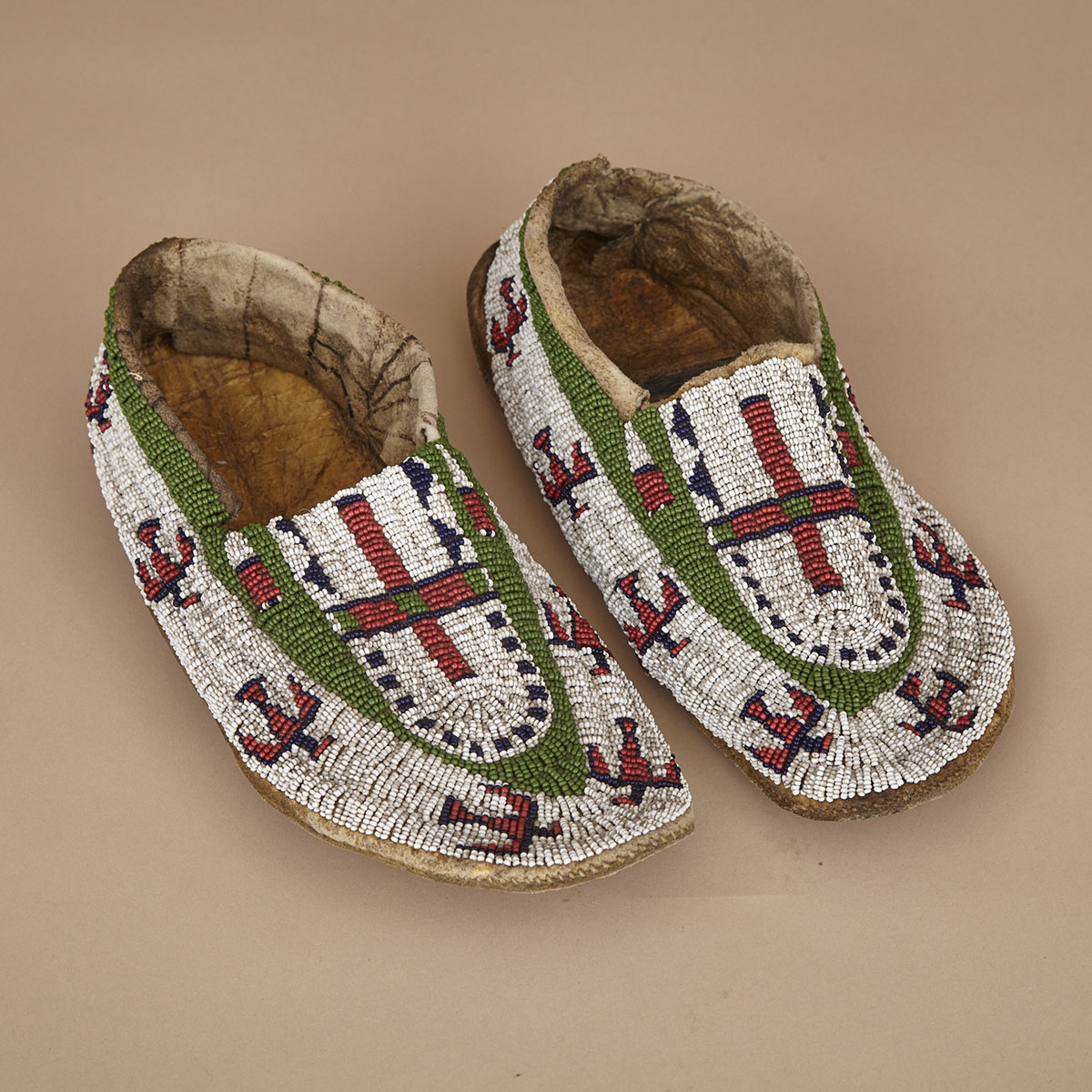 PLAINS MOCCASINS DECORATED WITH THUNDERBIRDS