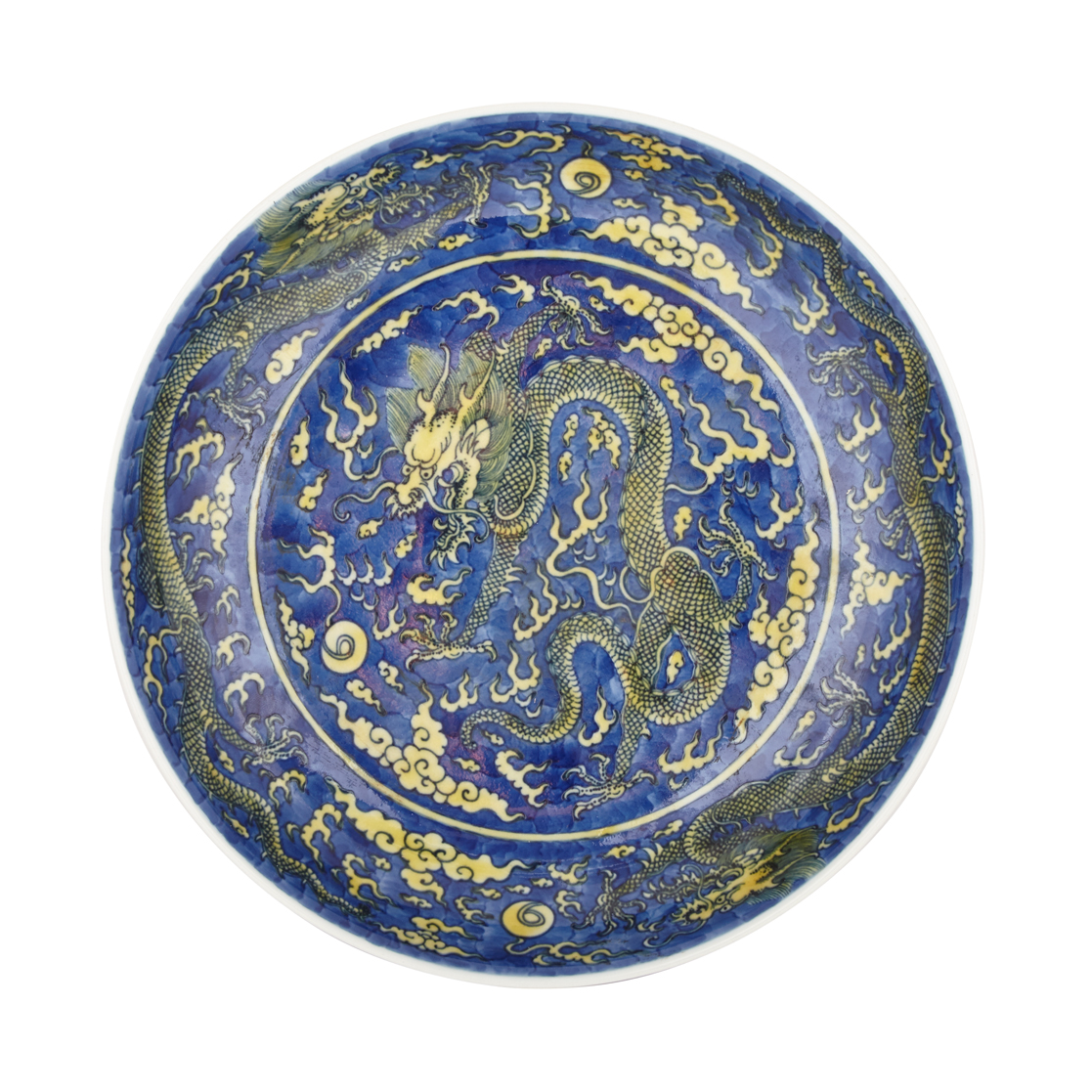 A Fine and Rare Underglaze-Blue and Yellow-Enamelled ‘Dragon’ Dish, Jiaqing Seal Mark in Underglaze Blue and Possibly of the Period (1796-1820)