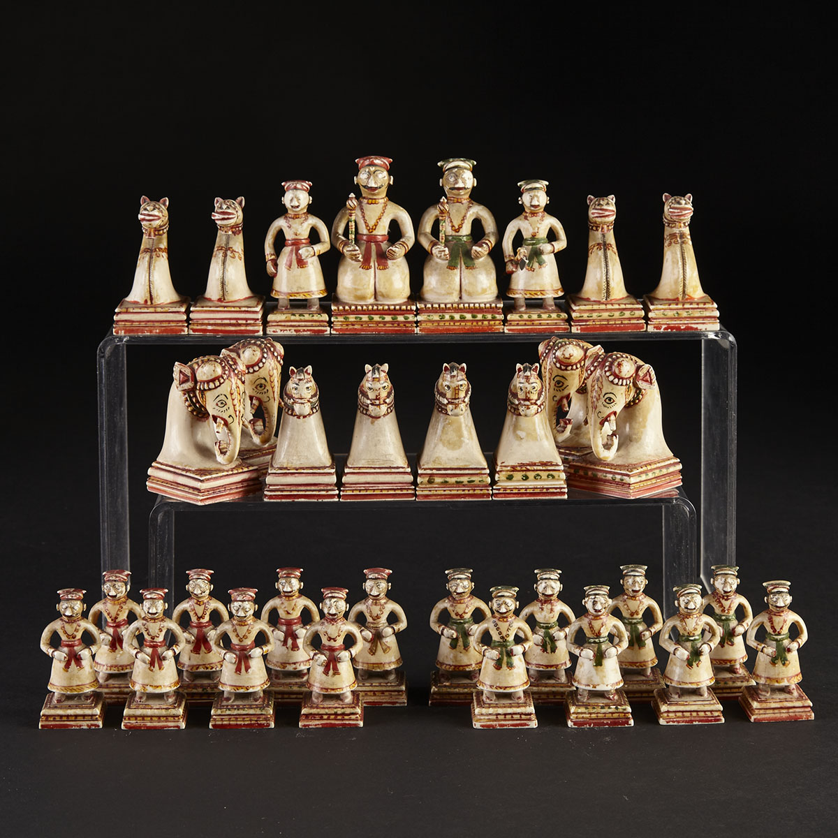 Mughal Carved and Polychromed Figural Chess Set, Rajasthan, early 19th century