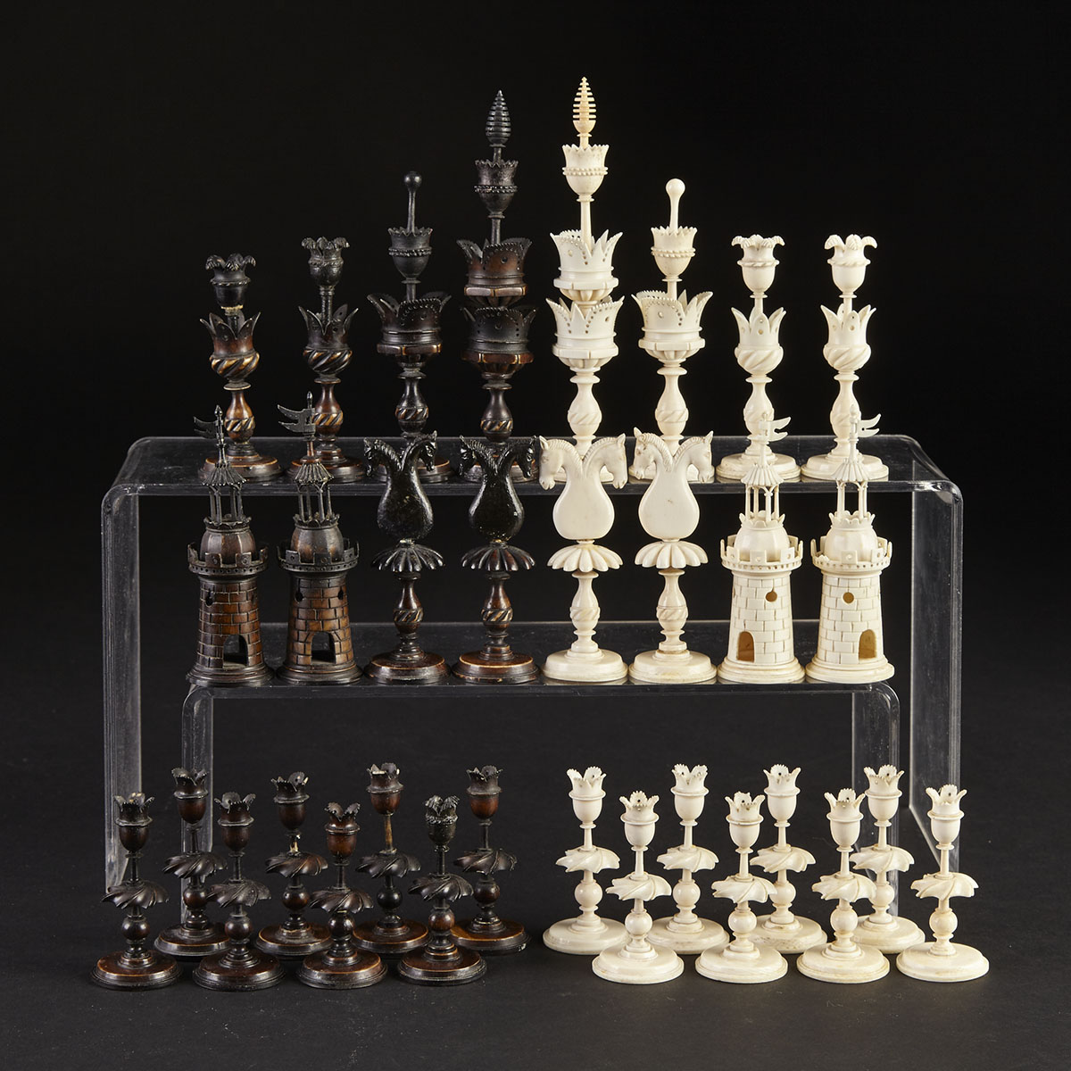 German Turned and Carved Ivory and Bone ‘Selenus’ Type Chess Set, early 19th century
