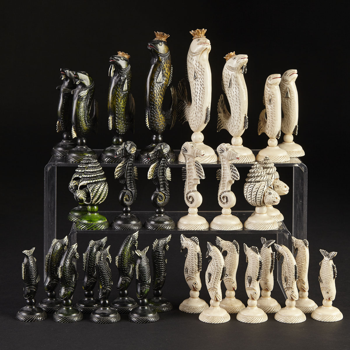 Portuguese Turned and Carved Ivory ‘Marine Life’ Chess Set, early-mid 20th century