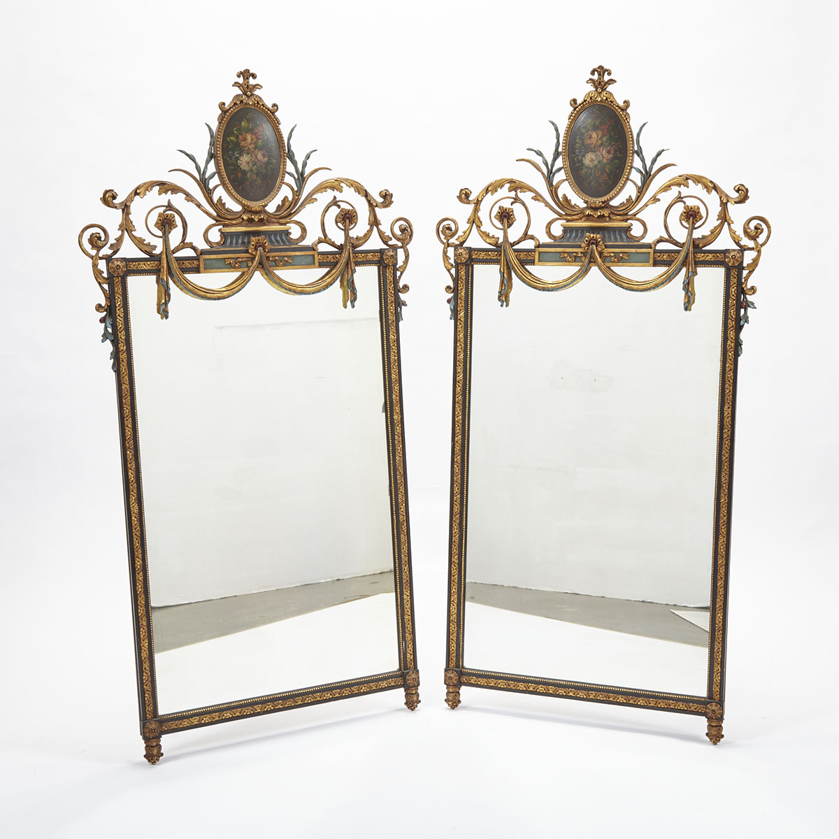 Pair of Italian Neoclassical Polychromed and Parcel Gilt Mirrors, early 20th century
