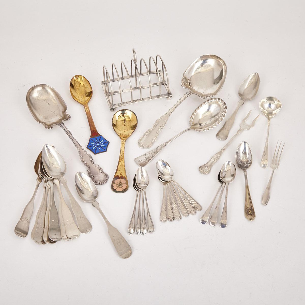 Grouped Lot of English Silver Toast Rack, William Hutton & Sons, Sheffield, 1913 and Mixed English, Danish and North American Silver Flatware, 19th/20th century