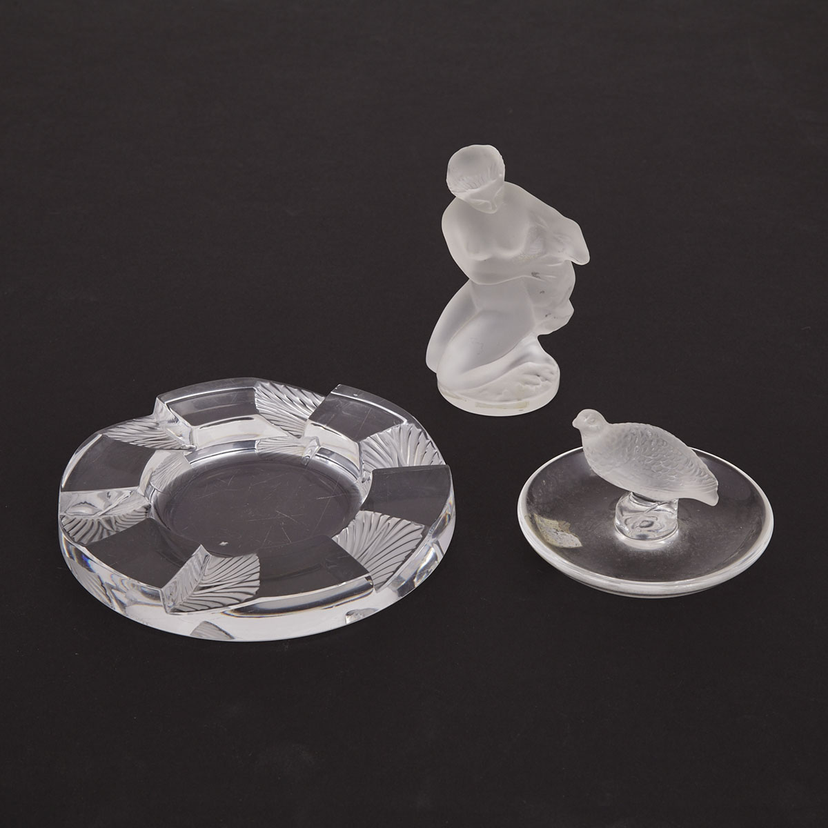 Lalique Moulded and Frosted Glass Statuette, Ring Tray and an Ashtray, post-1945