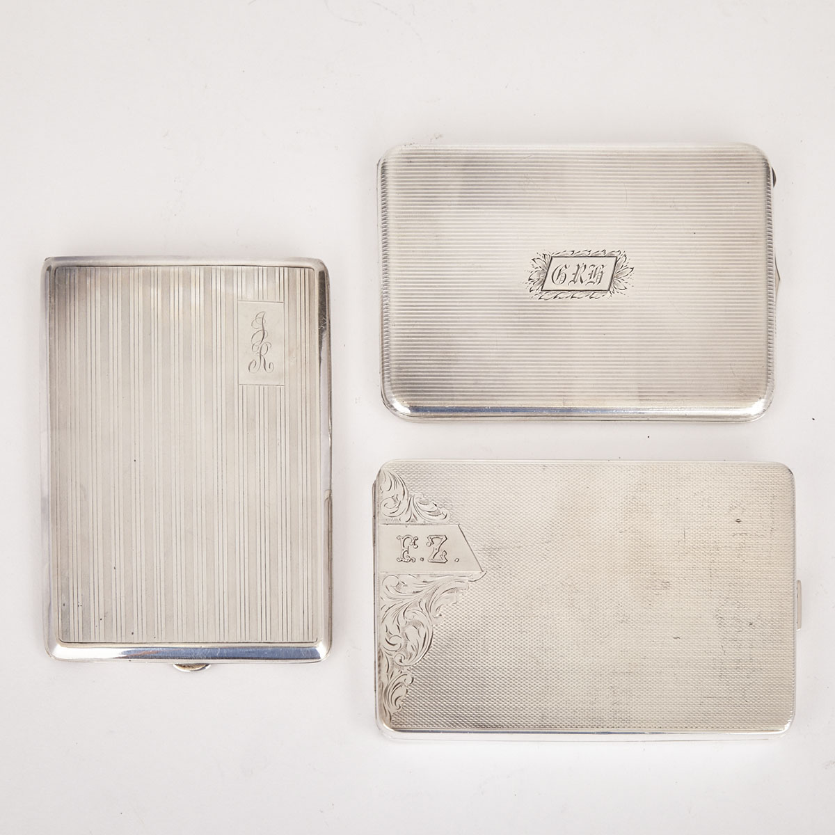 Three Various Silver Cigarette Cases, 20th century