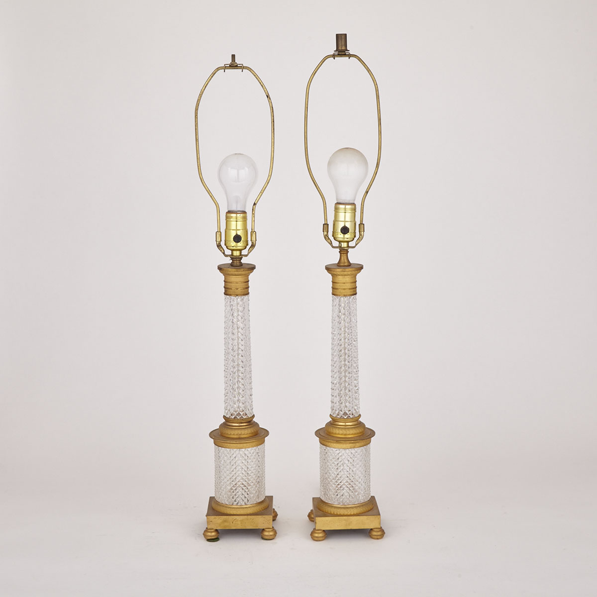 Pair of Austrian Ormolu Mounted Cut Glass Column Form Table Lamps, mid 20th century