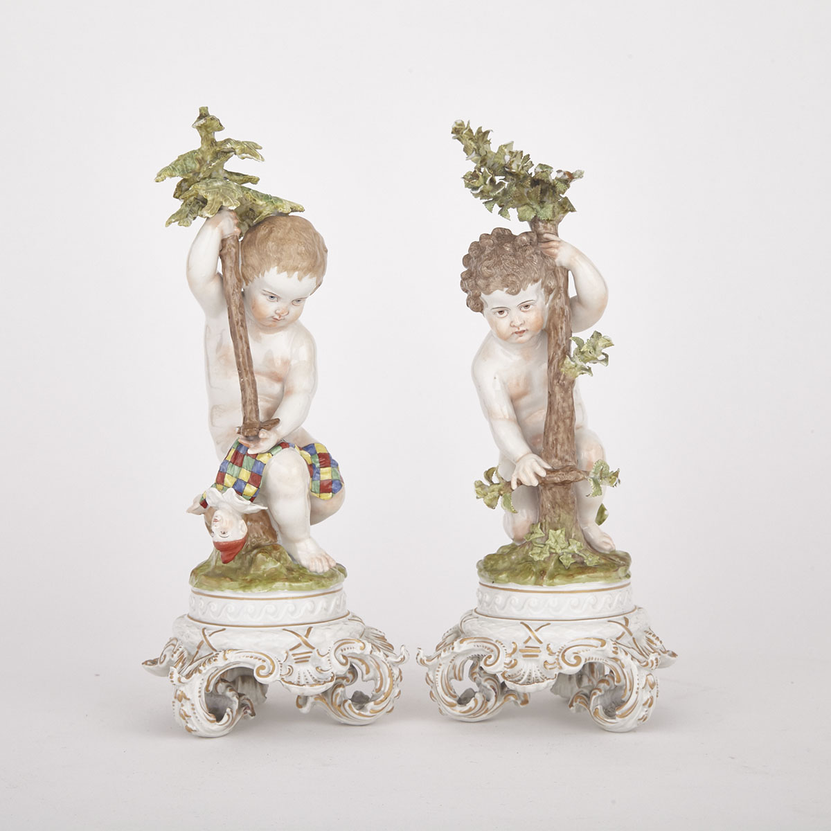 Pair of ‘Vienna’ Figures of Putti, 19th century