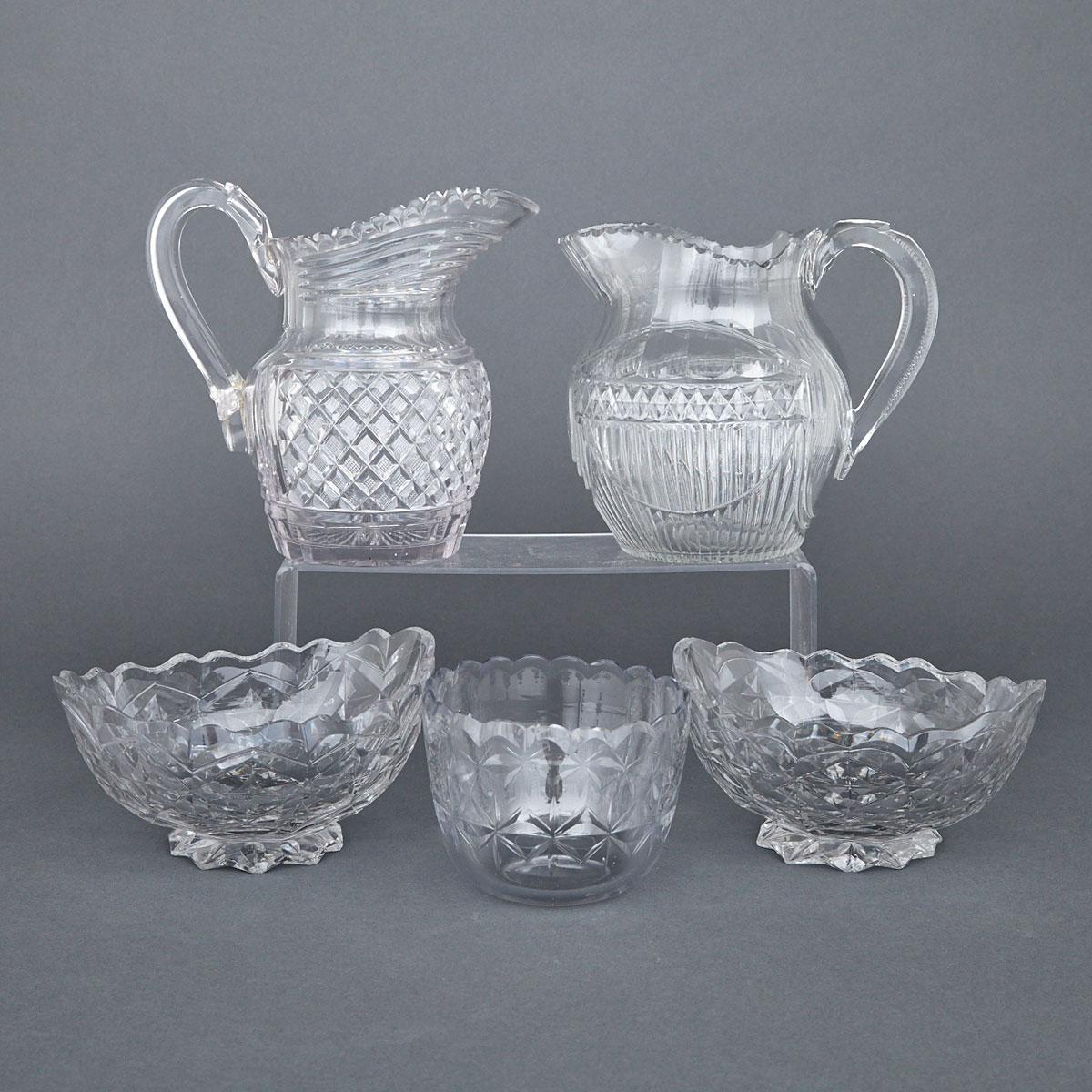 Two Anglo-Irish Cut Glass Water Jugs, Pair of Oval Bowls and a Blending Bowl, late 18th/early 19th century