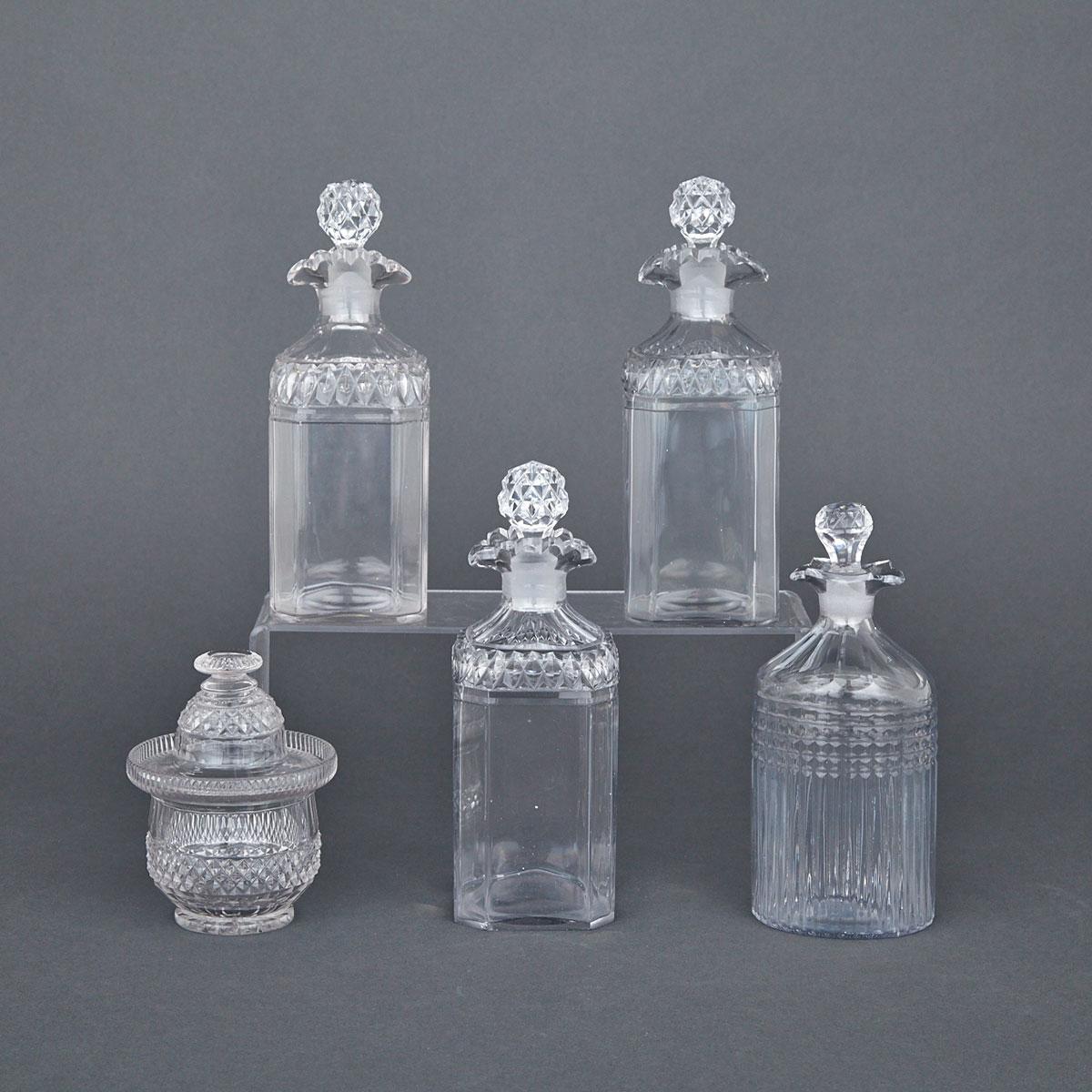 Anglo-Irish Cut Glass Covered Sweetmeat Jar and Four Various Spirit Decanters, early 19th century