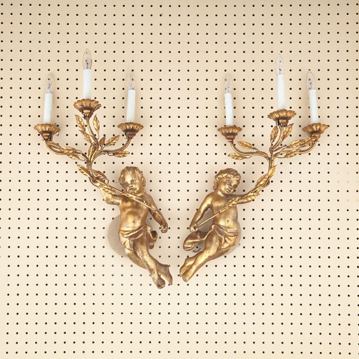 Pair of Florentine Carved Gilt wood and Iron Figural Three Light Wall Sconces, mid 20th century