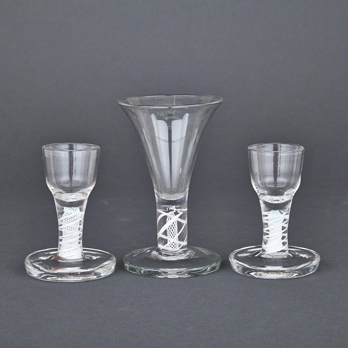 Three Continental Opaque Twist Stemmed Firing Glasses, 19th century