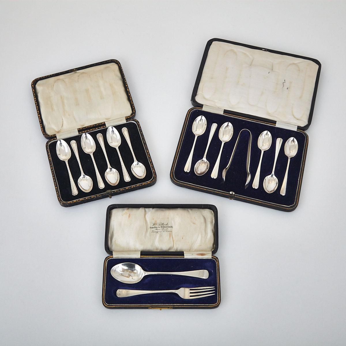 Two Sets of Six English Silver Coffee Spoons, One with Sugar Tongs and a Child’s Spoon and Fork, 20th century
