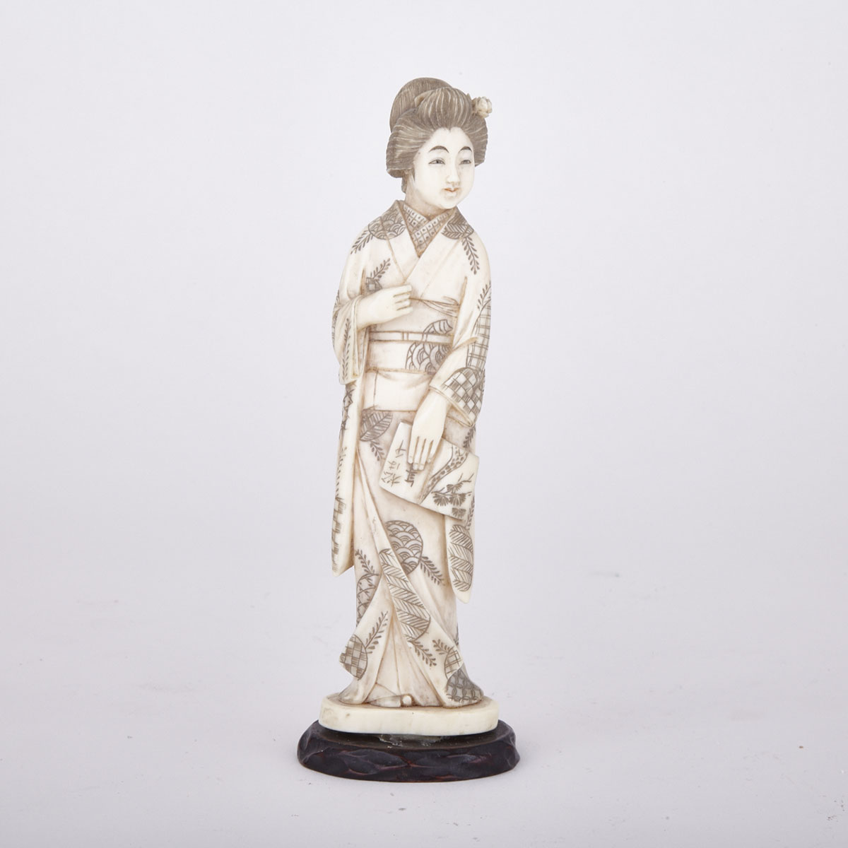 Tinted Ivory Okimono of a Bijin, Circa 1900
