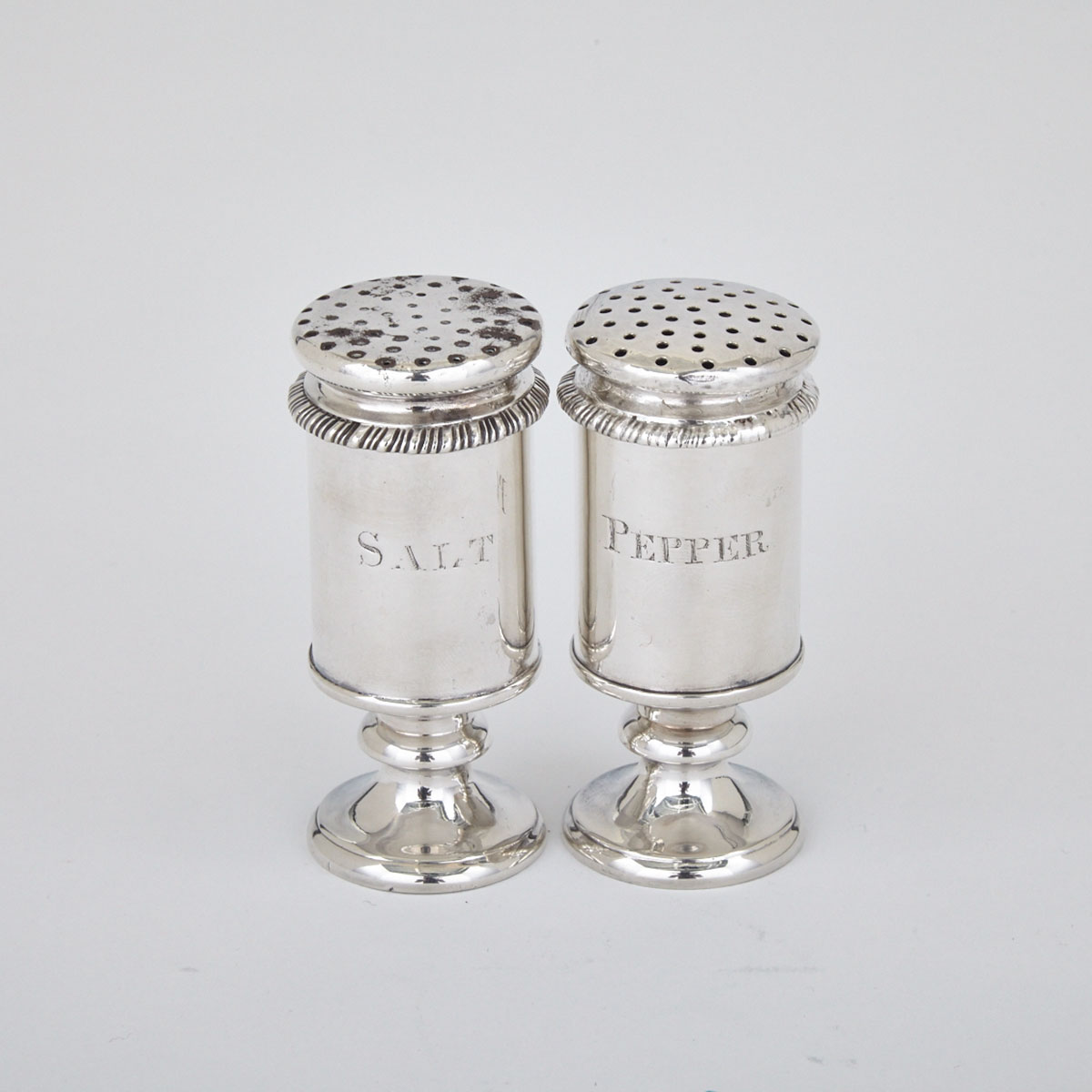 Pair of Indian Colonial Silver Salt and Pepper Casters, probably Calcutta, c.1830