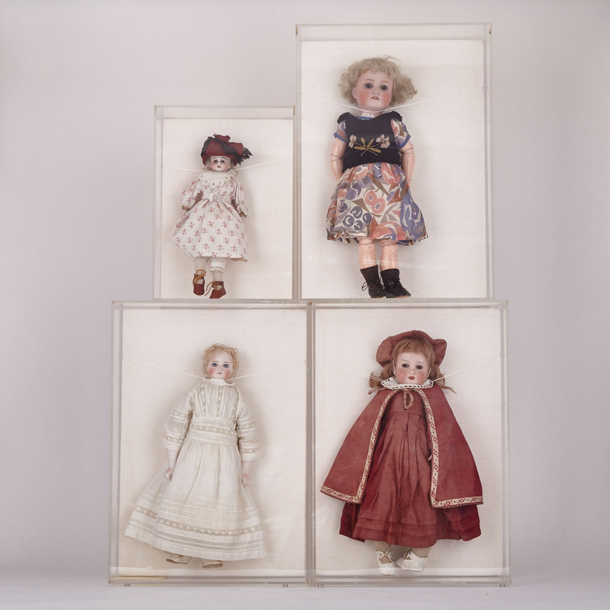 Four German Bisque Head Dolls, 19th century