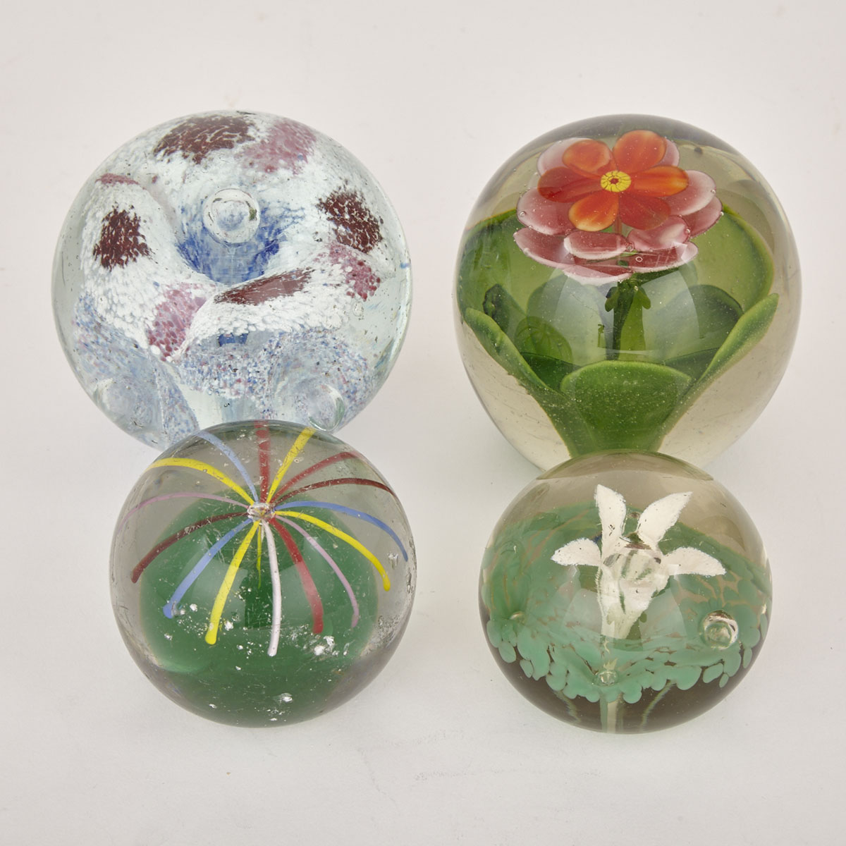 Four Victorian Floral Glass Paperweights/Doorstops, 19th century