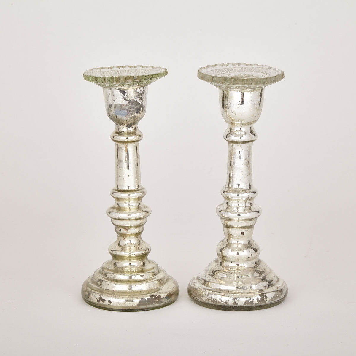 Pair of Canadian Napanee Glass House Mercury Glass Candlesticks, 19th century