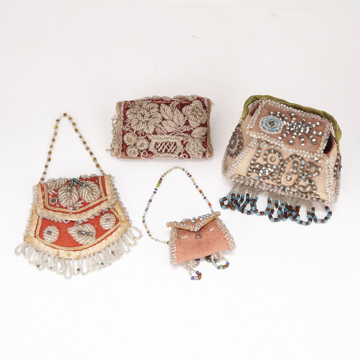 Four Iroquois Beadwork Purse Form Whimsies, late 19th/early 20th century