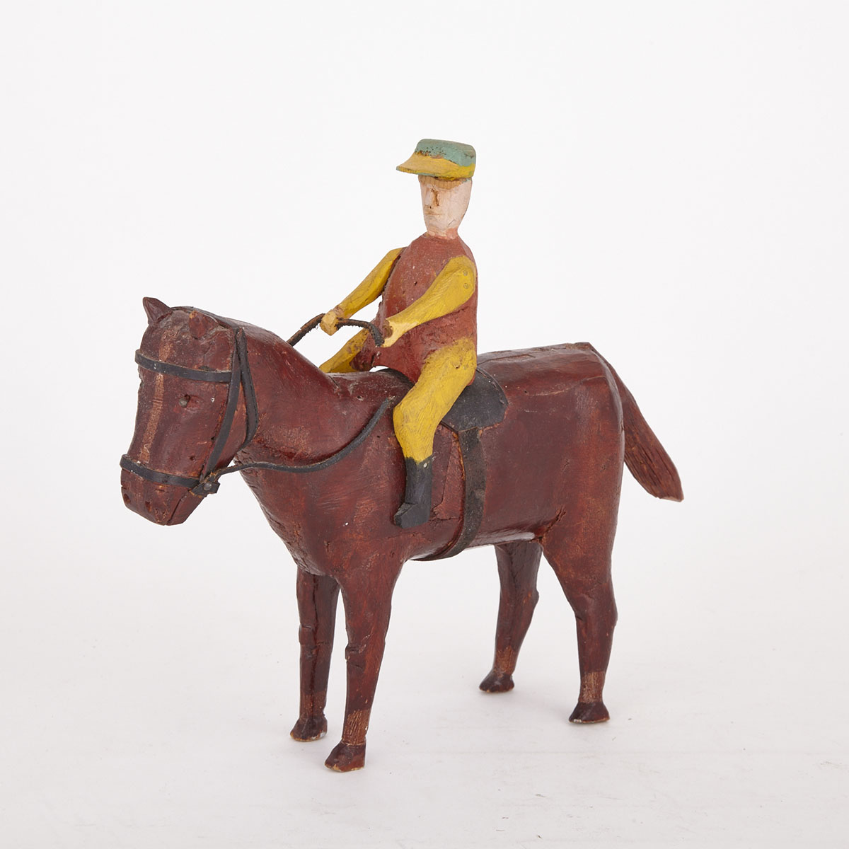 Carved and Polychromed Group of a Jockey on Horseback, mid 20th century