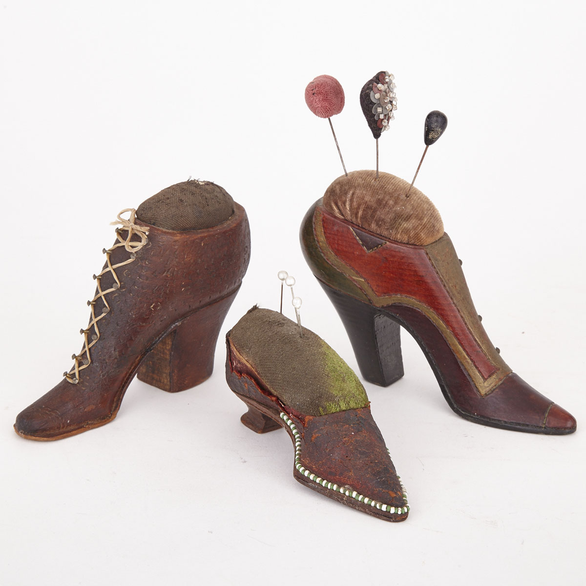 Three Victorian Shoe Form Pin Cushions, 19th/early 20th century