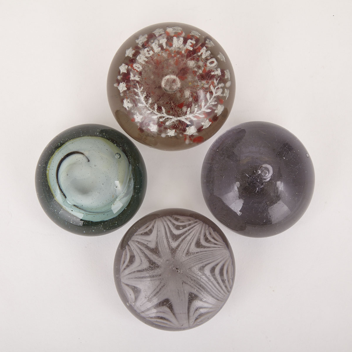 Four Victorian Glass Paperweights/Doorstops, 19th century