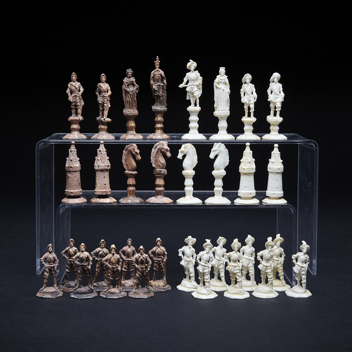 German Carved Ivory ‘Zimmerman’ Style Figural Chess Set, mid 19th century