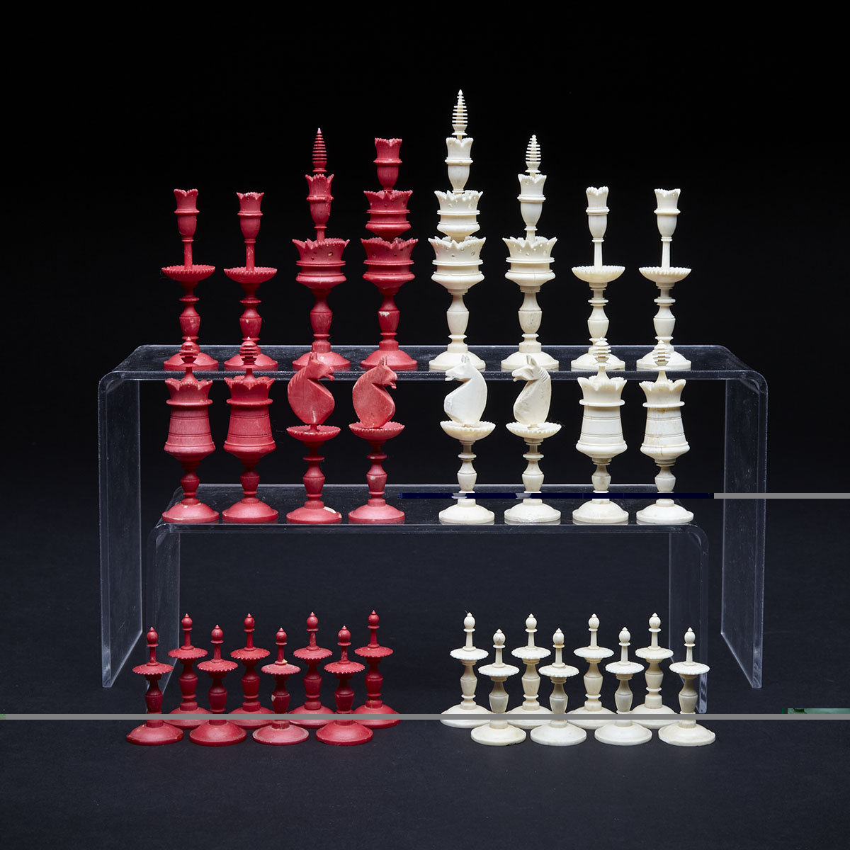 German Turned, Carved and Polished Bone ‘Selenus’ Type Chess Set, early 19th century