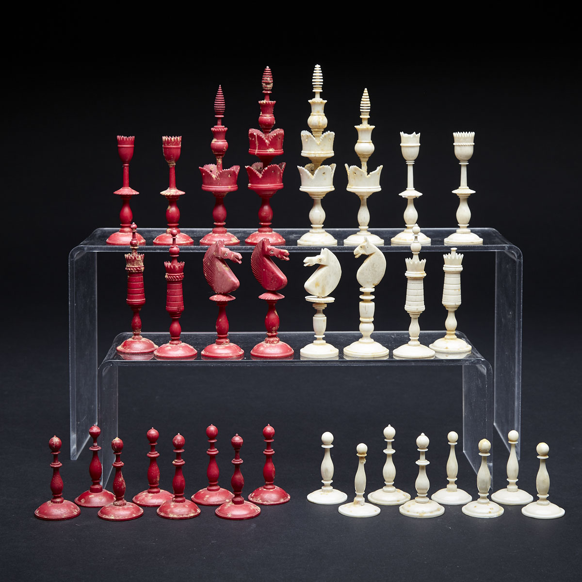 German Turned, Carved and Polished Bone ‘Selenus’ Type Chess Set, 19th century