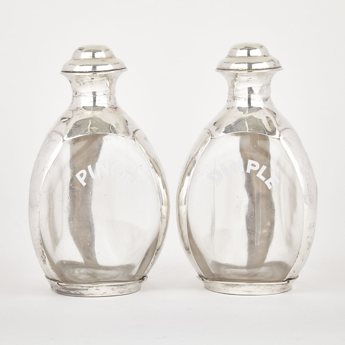 Pair of Mexican Silver Mounted Haig’s Scotch Whiskey Bottles, 20th century