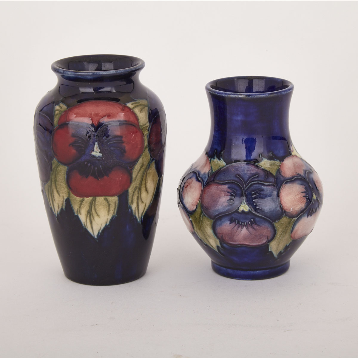 Two Moorcroft Pansy Small Vases, c.1925-30