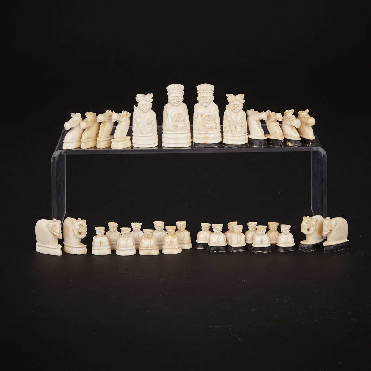 Small Indian Carved Ivory Figural Chess Set, 19th century