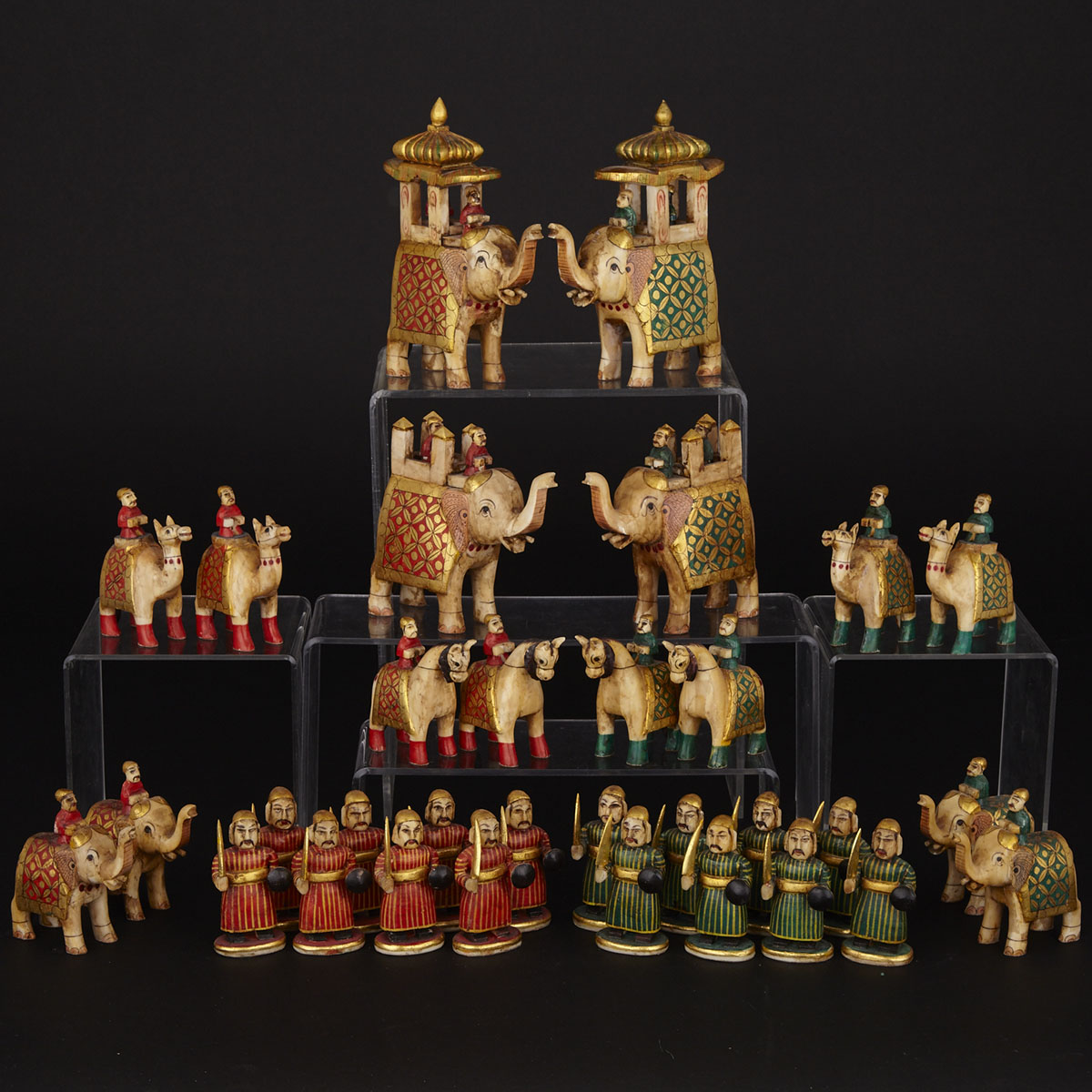 Indian Carved, Polychromed and Parcel Gilt Bone Figural Chess Set, Rajasthan, 20th century