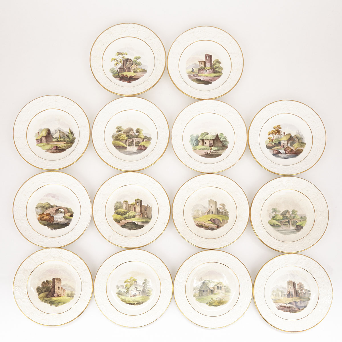 Set of Fourteen Wilson Moulded Pearlware Topographical Dessert Plates, c.1815