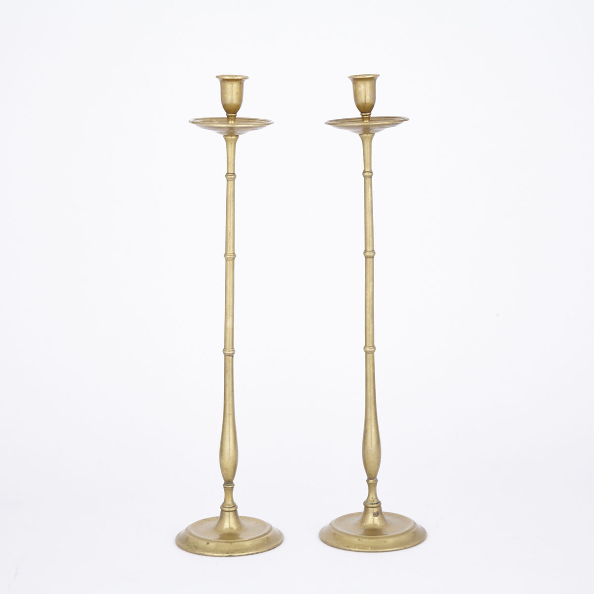Pair of Tall Slender Turned Brass Candlesticks, early-mid 20th century
