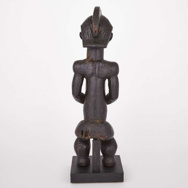 Fang Carved Wood Male Reliquary Figure with applied copper eyes, Central Africa, 20th century