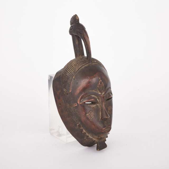 Baule / Yaure Carved Wood Female Mask, West Africa, 20th century 
