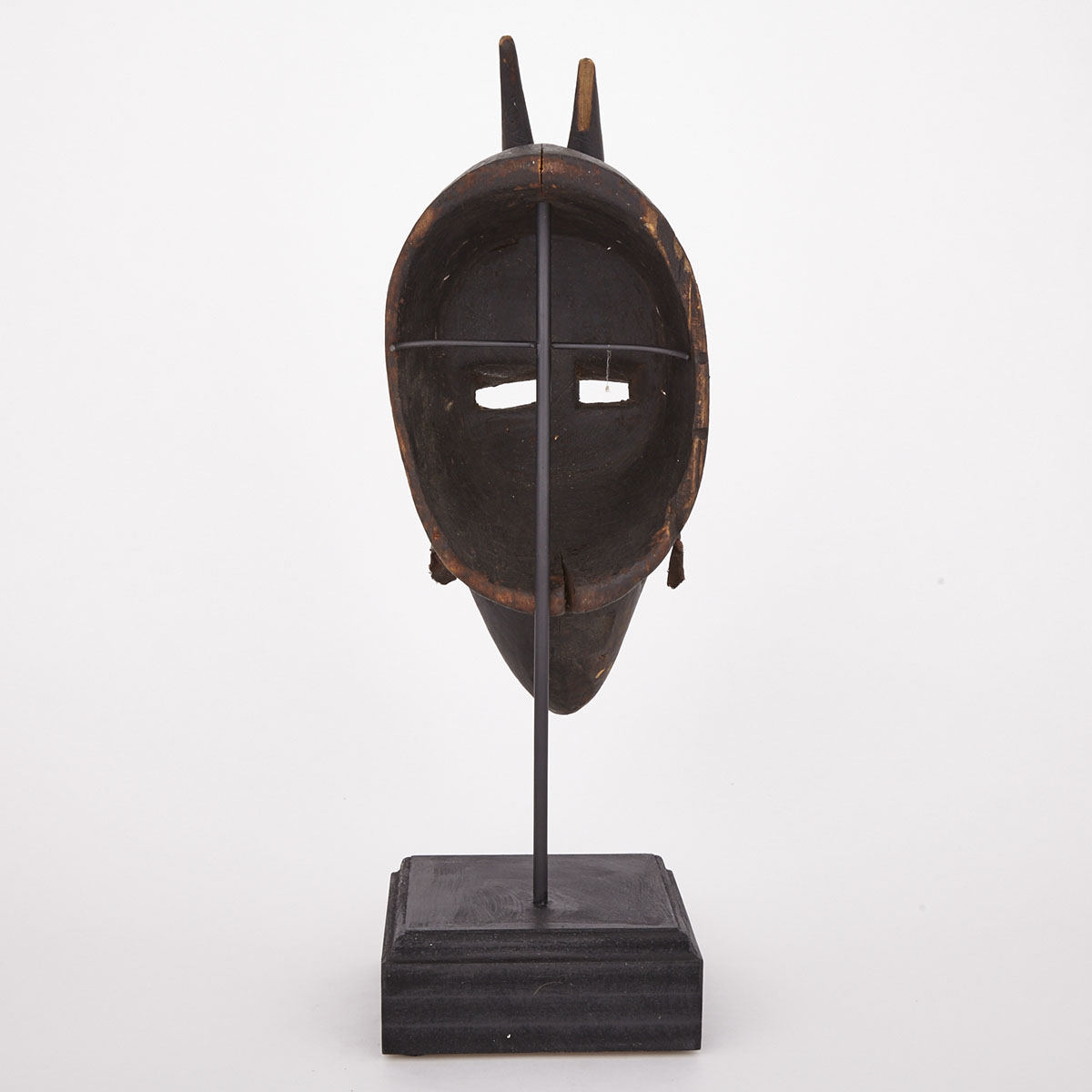Marka Carved and Painted Wood Mask with copper and thread decoration, West Africa, 20th century