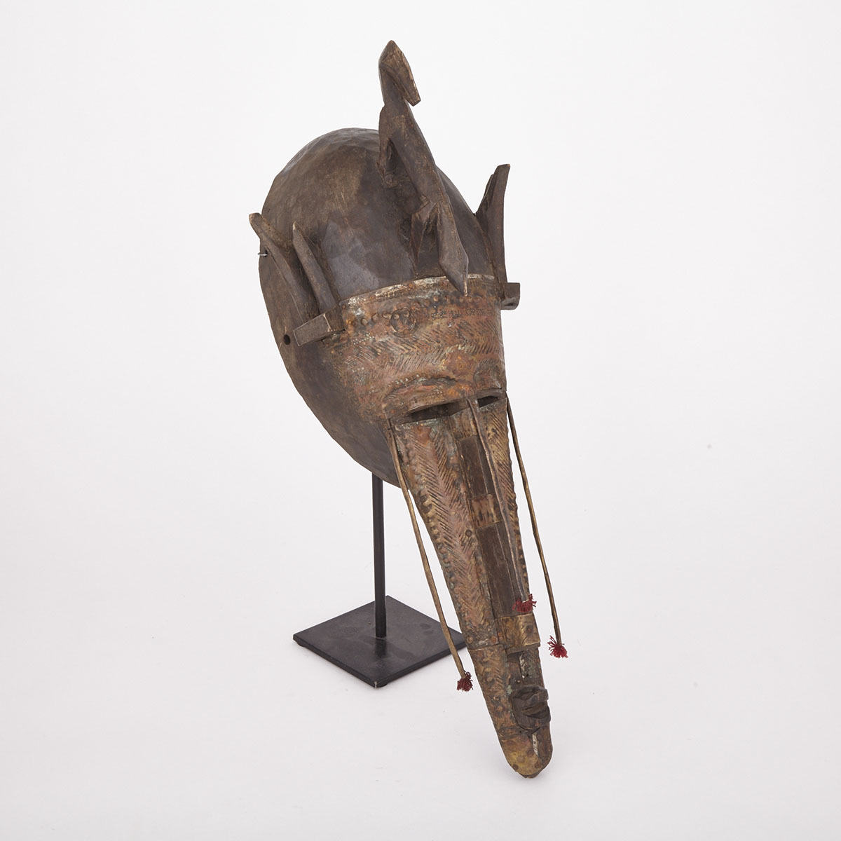 Marka Carved Wood Mask with copper and thread decoration, West Africa, 20th century