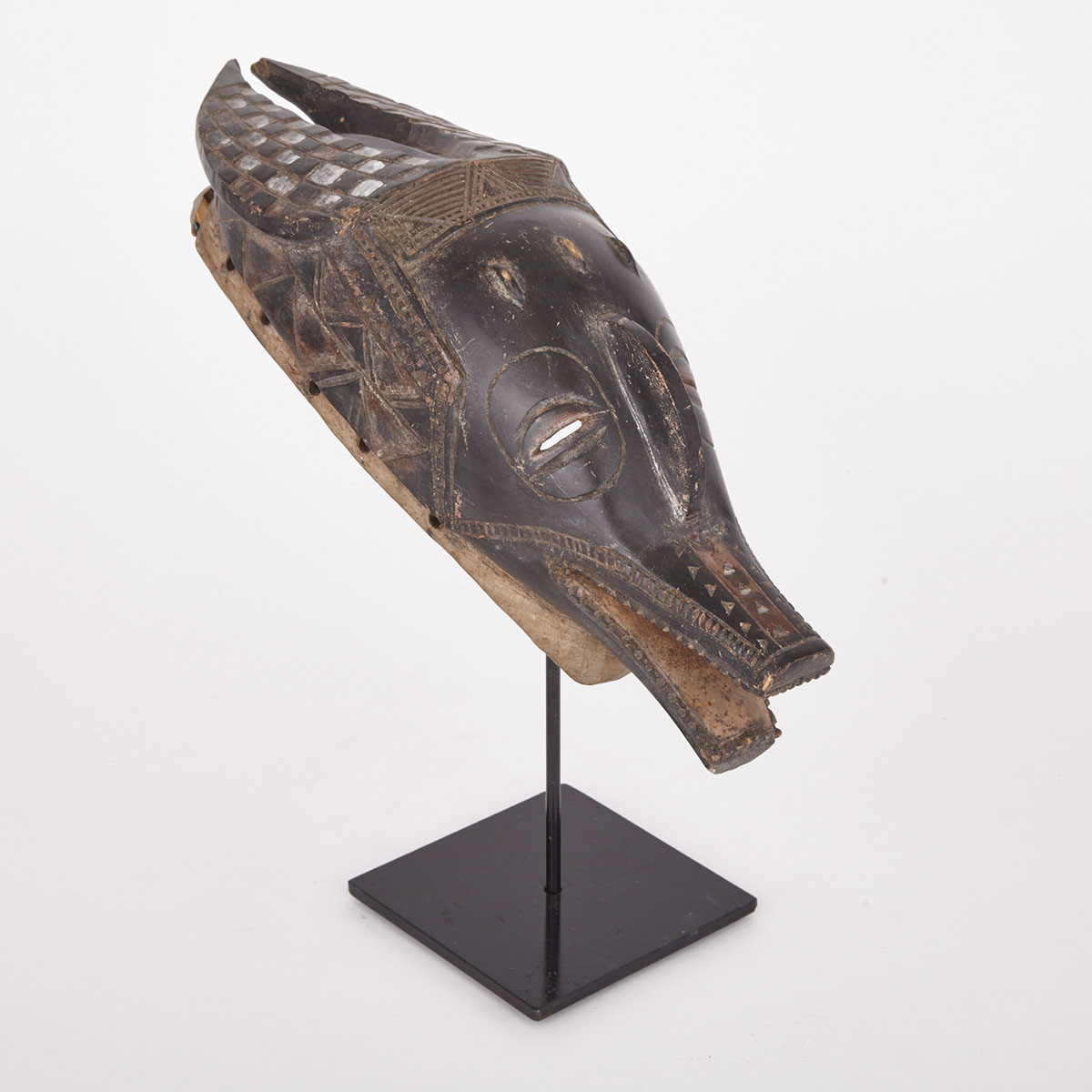 Guro Zamble Zoomorphic Carved and Painted Wood Mask, West Africa, 20th century