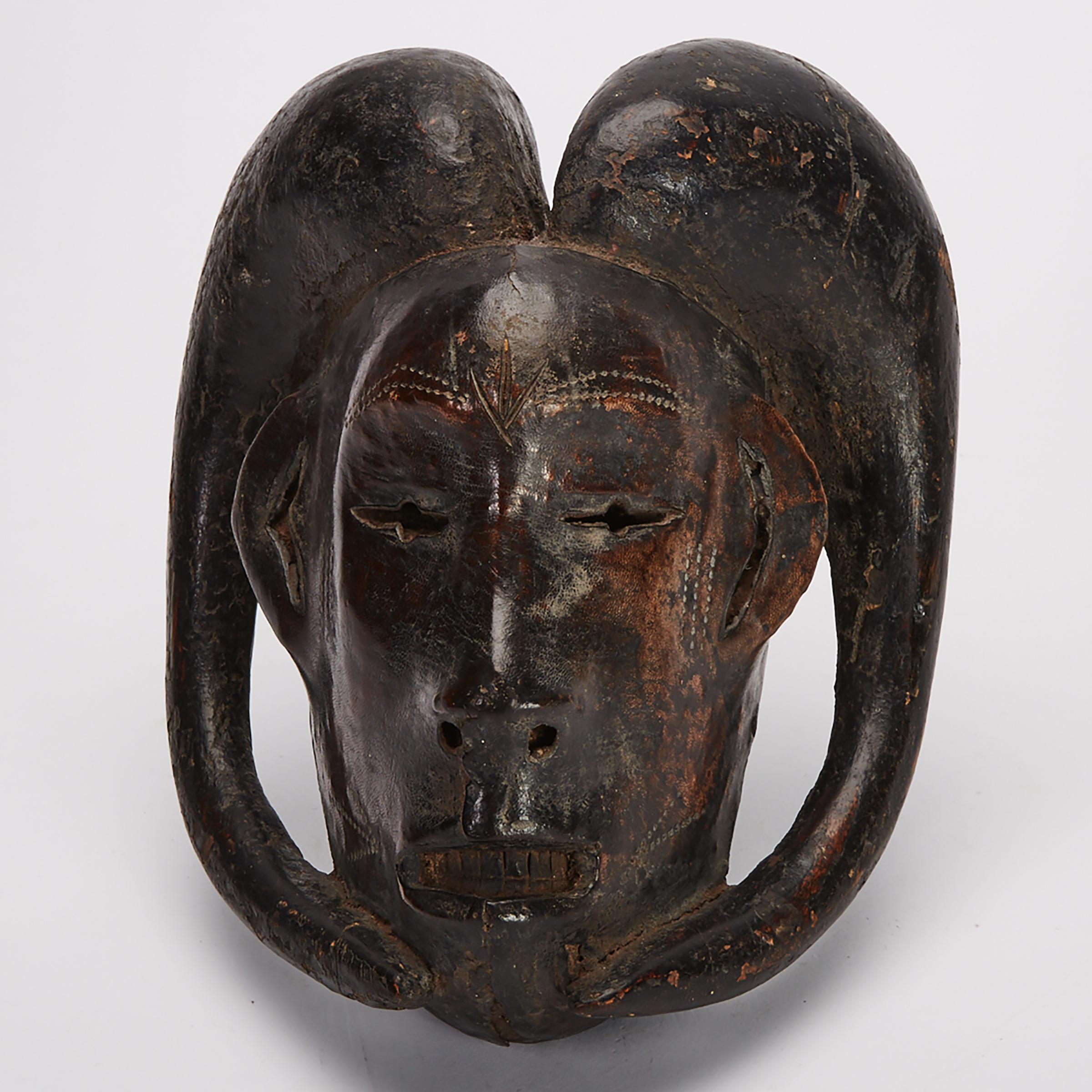 Anthrop-zoomorphic mask, possibly Ekoi or Guro, Africa