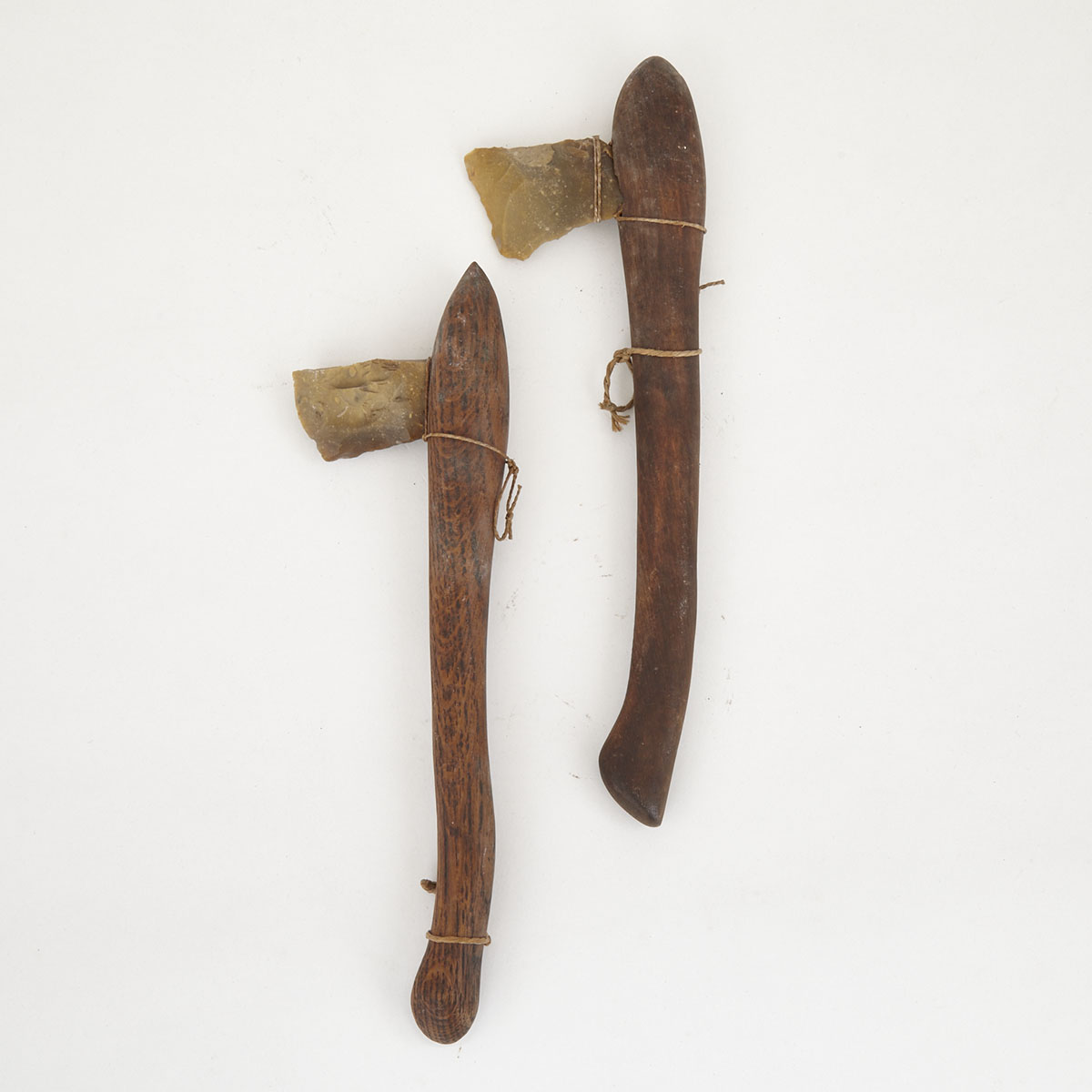Two Axes with Stone Heads and Wooden Handles