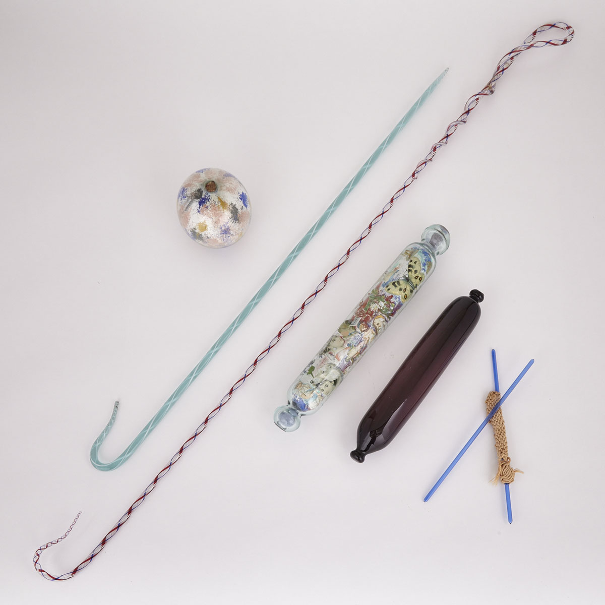 Nailsea-Type Coloured Glass Whip, Cane, Witch’s Ball, Pair of Knitting Needles and Two Rolling Pins, 19th century