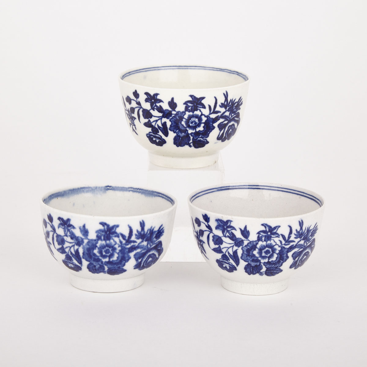 Three Worcester ‘Three Flowers’ Pattern Tea Bowls, c.1770-80